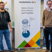 Dr. Stefan Jakob und Dr. Andreas Witsch sprechen Micromata-Grußwort bei der RoboCup-Quali der Junioren 2025 an der Uni Kassel